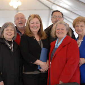 image2 Oregon Association of REALTORS® President Eva Sanders, President Elect Bob McClung and Chair of Professional Development, Robin Risley pose for a photo with colleagues and State Representative Debbie Boone during the 2013 REALTOR® Rally at the Capitol.